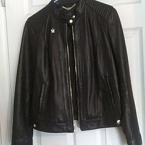 Cole Haan ladies black leather jacket size med. Originally159.00 price 50.00